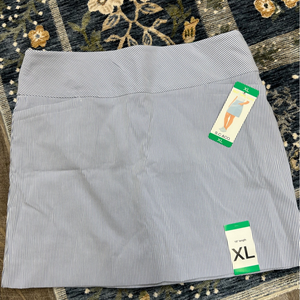 Blue and white striped skort , new with tags